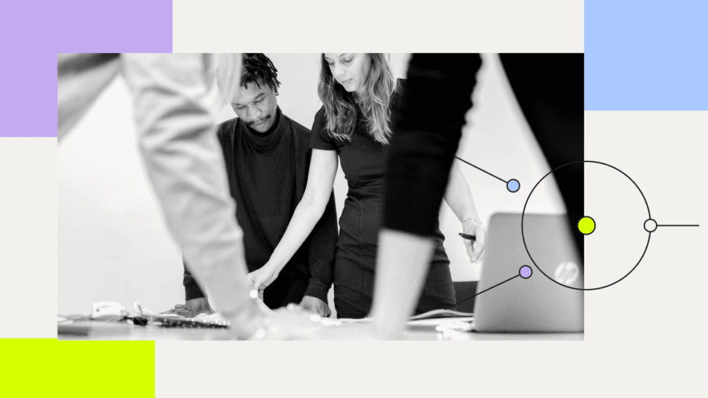 Colleagues working around a table with overlaid circles and coloured panels