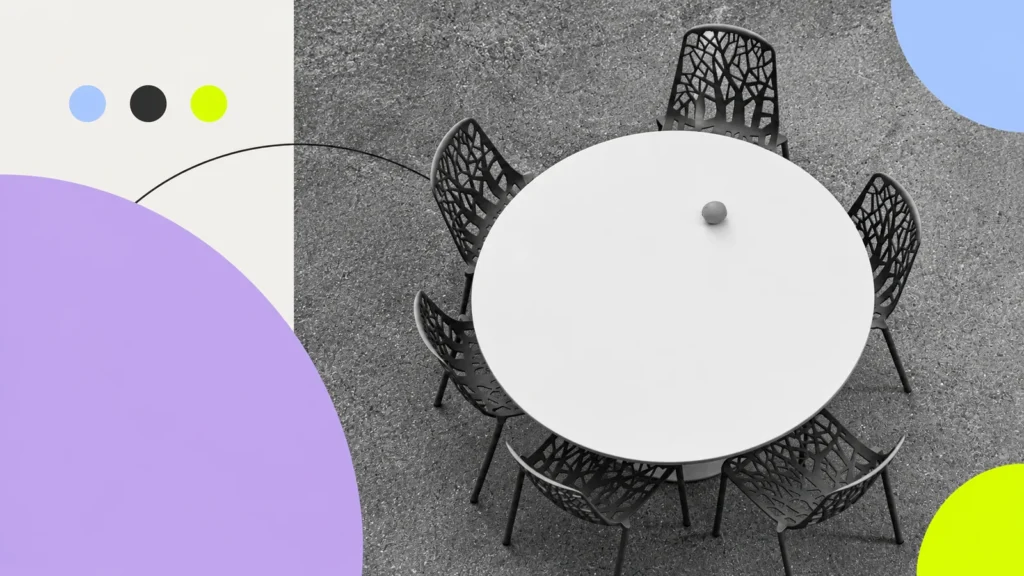 Chairs arranged around a round table, viewed from above.